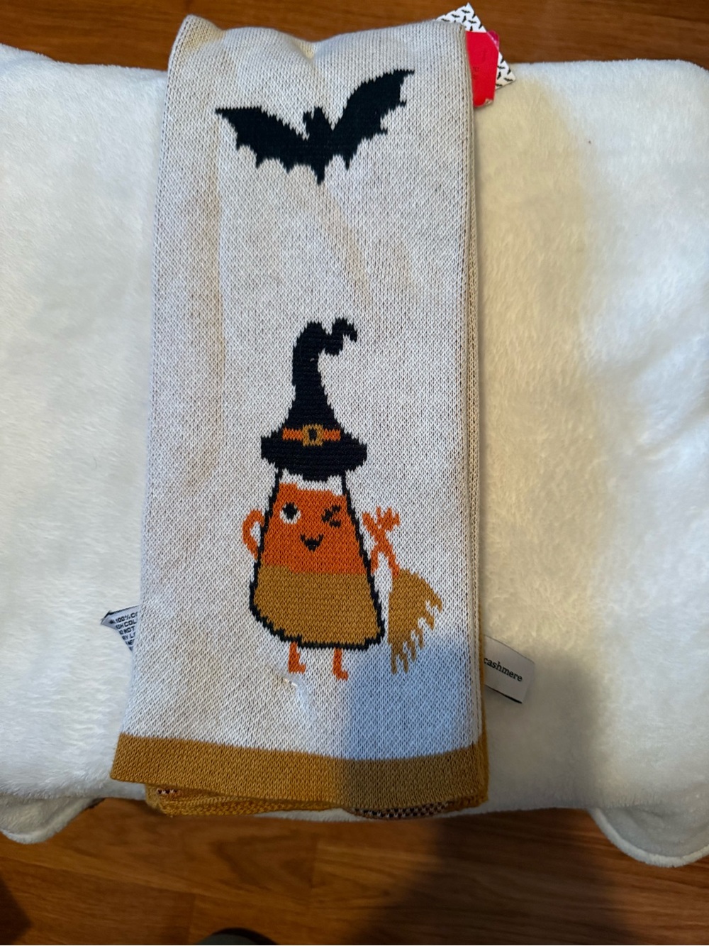 cupcakes & cashmere Beige Candy Corn Witch hand towels with Black Bat